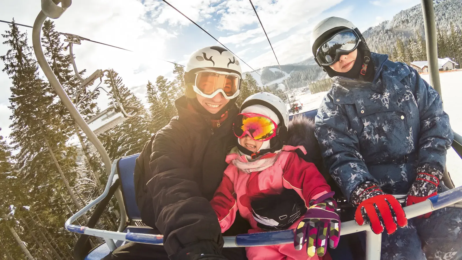 family on ski lift